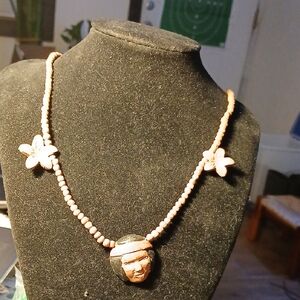 Handcrafted Beaded Necklace with Floral Accents